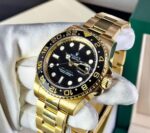 Rolex&nbsp;&nbsp;-&nbsp;&nbsp;GMT MASTER II YELLOW GOLD WITH BLACK DIAL